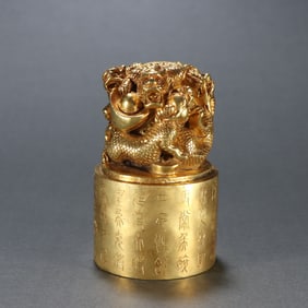 A fine copper gilt dragon button seal