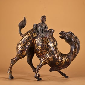 A fine bronze wrong gold camel man