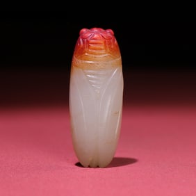 A beautiful white jade red jade cicada ornament
