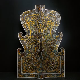 A bronze gold and silver shield from the Warring States period