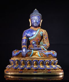 A fine lapis lazuli Shakyamuni Buddha Tibetan silver cloisonné inlaid with gemstones
