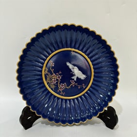 A Qing Dynasty Yongzheng year system with blue gold painting wishes become a lotus plate