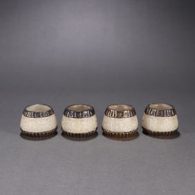 A set of exquisite copper-inlaid jade cups