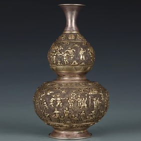 A Qing Dynasty sterling silver partially gilt hundred seed gourd bottle