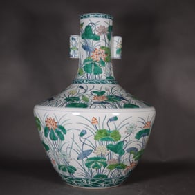 A blue and white colorful lotus piercing ear square shoulder bottle made in the Qing Dynasty