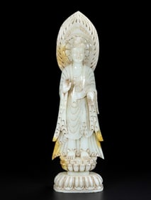 A Hetian jade Buddha statue of the Warring Han Dynasty