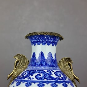 A beautiful blue and white cloud dragon pattern inlaid bronze swan amphora jade pot spring statue