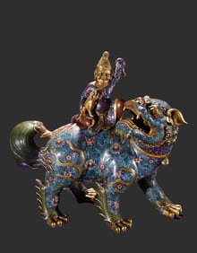 A fine gilt cloisonné enamel colorful Hu man lion ornament