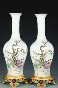 A pair of Qing Dynasty filigree gilt inlaid porcelain figure bottles