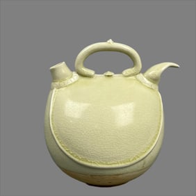 A white glazed flake pattern skin pot of the Sui Dynasty