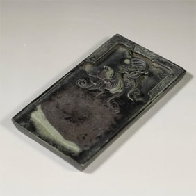 A Qing Dynasty longevity peach bat pattern end inkstone