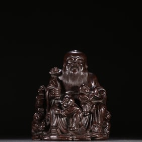 A Qing Dynasty rosewood birthday star ornament