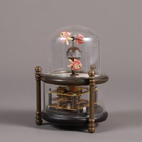 A beautiful bronze carved mechanical clock ornament