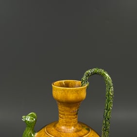 A three-glazed phoenix head pot from the Gongxian kiln in the Tang Dynasty
