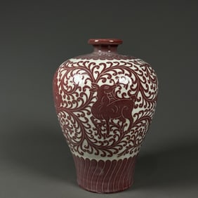 A red flower beast pattern plum bottle from the Song Dynasty Ding kiln