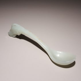 A beautiful Hetian jade carving poetry dragon head spoon