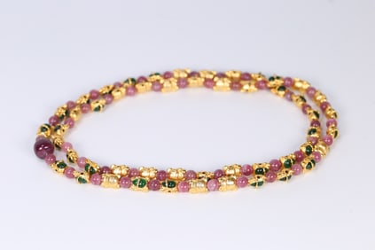 A beautiful tourmaline silver-gilt jade bear necklace