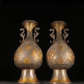A pair of copper-gilt silver carved dragon and phoenix pattern appreciation vases from the Tang