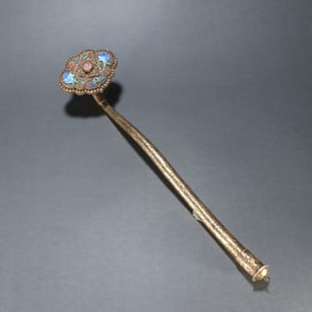 A silver-gilt baked blue pattern ruyi ornament of the Qing Dynasty
