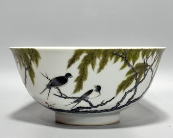 A pair of enamel colorful apricot forest spring swallow bowls made in the Yongzheng year