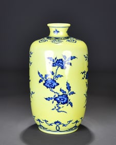 A yellow-glazed broken branch flower pattern plum bottle made in the Yongzheng period of the Qing