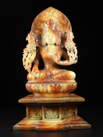 A Hetian jade Buddha statue from the Han Dynasty