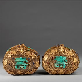 A pair of silver silk peach-shaped turquoise powder boxes from the court period