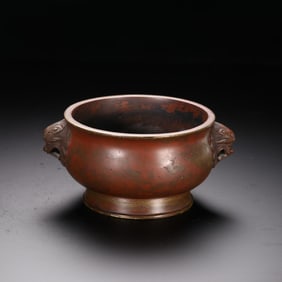 A copper-tired lion head and ear incense burner of the Ming Dynasty