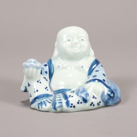 A beautiful blue and white Maitreya Buddha ornament