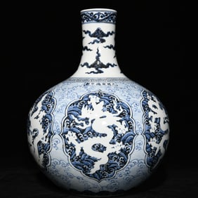 A blue and white white seawater dragon pattern celestial sphere vase made in the Xuande year of the