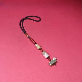 A beautiful Hetian jade birth pit full of charms