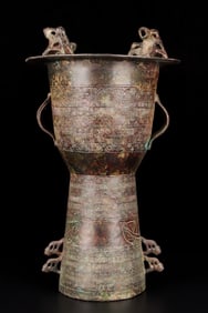 A bronze auspicious beast drum from the Warring Han Dynasty