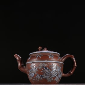 A famous purple sand colored teapot