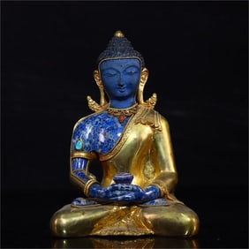 A fine lapis lazuli inlaid with copper gilt Shakyamuni Buddha