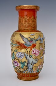 A pastel gold ground carved flower and bird pattern holding a vase made in the Qing Dynasty
