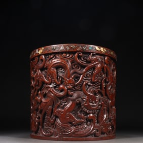 A Qing Dynasty Huanghuali dragon pattern inlaid conch pen holder