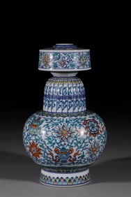 A Qing Dynasty blue and white colorful entwined lotus eight treasure pattern spray bottle