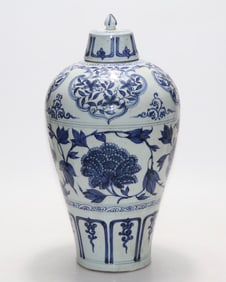 A Yuan Dynasty blue and white peony entwined plum vase