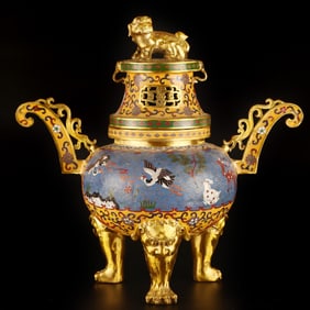 A Qing Dynasty copper-gilt cloisonné three-legged incense burner