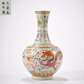 A pastel porcelain vase decorated with dragon and phoenix patterns from the official kiln of the