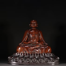 A beautiful seated statue of Shakyamuni in Huanghuali