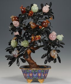 A piece of cloisonné jade bonsai pomegranate