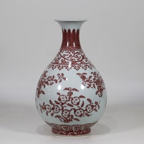 A Qing Dynasty Yongzheng glazed red entwined flower three multi-pattern jade pot spring vase
