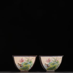 A pair of Qing Dynasty copper tire painting enamel mandarin duck picture tea bowls