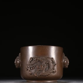 A bronze tire relief dragon playing pearl incense burner