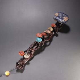A rosewood inlaid treasure ruyi ornament