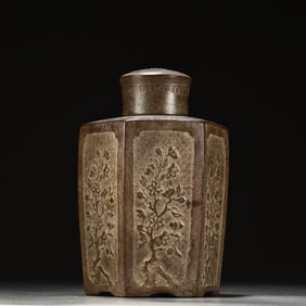 A beautiful hexagonal purple sand tea jar