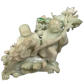 A jade carving and two immortal ornaments