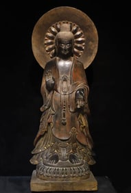 A bluestone painted Buddha of the Northern Wei Dynasty