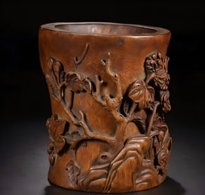 A Qing Dynasty agarwood high-relief flower conformal pen holder